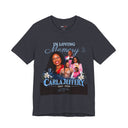 A dark heather gray graphic t-shirt featuring an illustration of Jesus and a child with speech bubbles reading 'I missed up, I can't be forgiven' and 'I forgive you my child' above the text 'Colossians 1:18-19'.